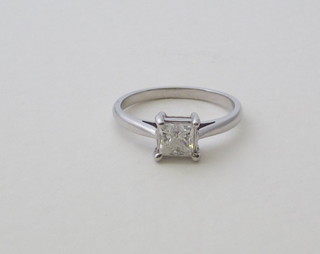 A lady's 18ct white gold dress/engagement ring set a square  Princess cut diamond, approx. 1ct