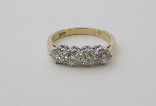 A lady's 18ct yellow gold dress ring set 4 diamonds, approx  1.45ct