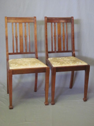 A set of 6 Edwardian stick and bar back dining chairs