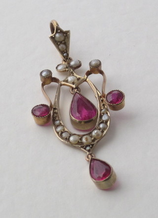 A 9ct gold pendant set pearls and red stones