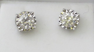 A pair of brilliant cut diamond ear studs, approx 1.43ct