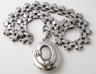 A "Victorian" silver locket hung on a silver chain