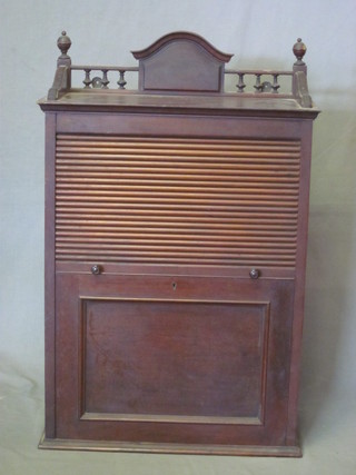 A Victorian mahogany dental cabinet the top with three-quarter gallery, the interior fitted 12 short drawers by the Dental  Manufacturing Company Ltd 23"
