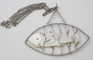 A silver chain hung a fish pendant and a silver cross
