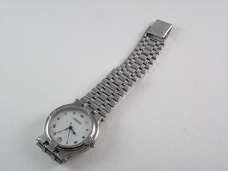 A lady's Gucci wristwatch contained in a stainless steel case