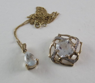 A topaz and diamond set pendant and a topaz necklet