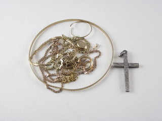 A silver cross, 4 gold chains etc