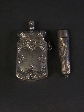 A silver cased cheroot case, some holes and a silver plated vesta case