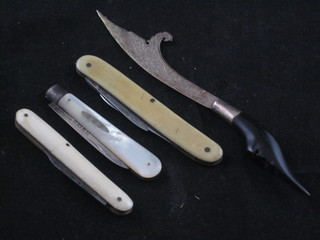 A silver bladed fruit knife with mother of pearl grip, 2 pocket knives and an Eastern paper knife with horn handle