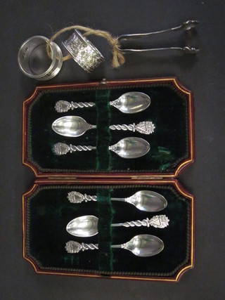 A set of 6 silver plated spoons decorated harps and 2 silver  napkin rings