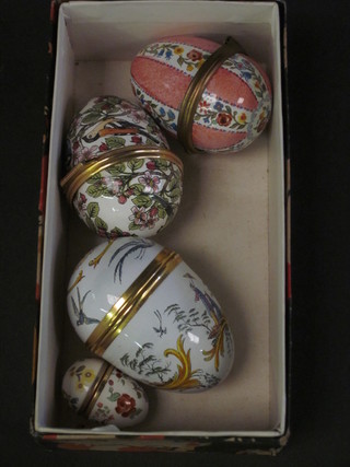 4 enamelled trinket boxes in the form of eggs