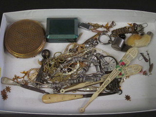 A collection of costume jewellery and other curios