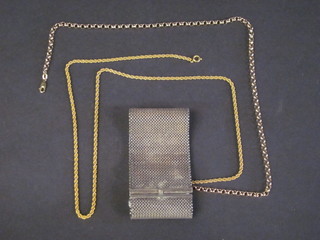 2 gilt metal chains and a silver bracelet
