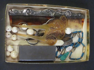 A silver comb and a collection of costume jewellery