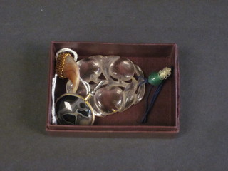 A rock crystal pendant decorated a bird, a hardstone watch key  and a claw pendant