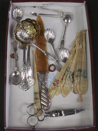 A pair of silver plated candle snuffers, a letter opener and various  silver plated spoons