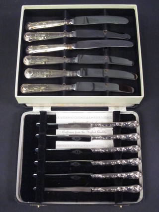 A set of 6 tea knives with silver handles, cased and a set of 6 Arthur Price tea knives
