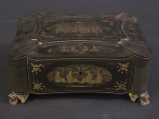 A 19th Century chinoiserie style lacquered sewing box with  hinged lid, the interior fitted various ivory items 12"