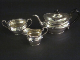 An oval silver plated 3 piece tea service comprising teapot, sugar bowl and milk jug