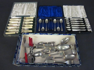 A set of 6 silver plated tea knives, a set of 6 silver plated fish knives and forks and a set of 6 silver plated teaspoons with tongs  and a small collection of flatware
