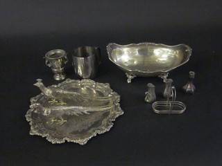 An oval boat shaped silver plated bowl, a salver and a small collection of plated items