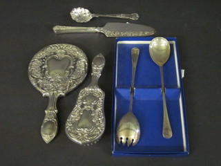 A silver plated hand mirror, do. hairbrush and a small collection of plated items