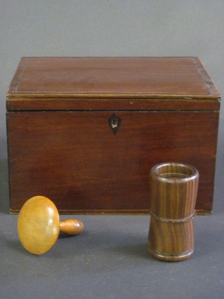 A 19th Century mahogany box with hinged lid 10", containing a  turned die shaker and darning mushroom