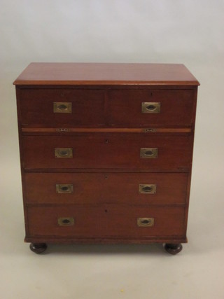 A 19th Century camphor Military chest, fitted 2 short drawers  with brushing slide above 3 long drawers, raised on bun feet with  brass counter sunk handles 36"