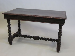 A Victorian carved oak side table fitted a drawer and raised on spiral turned supports with H framed stretcher 47"