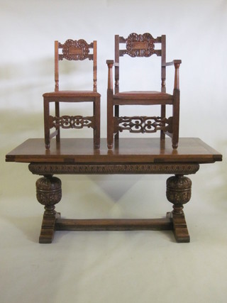 A handsome oak dining suite comprising a carved oak drawleaf refectory dining table raised on bulbous turned supports with H  framed stretcher and a set of 12 carved oak high back dining  chairs - 2 carvers, 10 standard