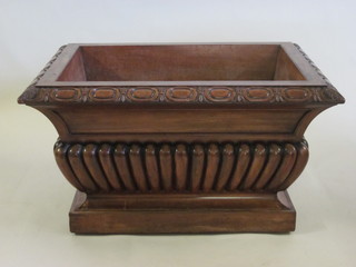 A 19th Century mahogany octagonal wine cooler of sarcophagus  form with demi-reeded decoration, 38"  ILLUSTRATED FRONT COVER