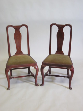 A pair of Queen Anne style mahogany slat back dining chairs  with upholstered drop in seats, raised on cabriole supports with H  framed stretchers