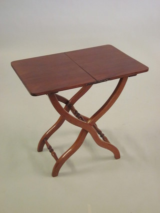 A rectangular mahogany folding coaching table