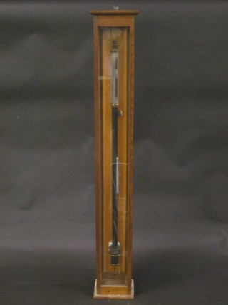 An Improved Fortin standard barometer no.2189 by Philip Harris of Birmingham contained in an oak case