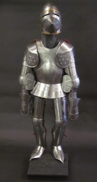 A reproduction suit of armour with Hun Skull Bassinet