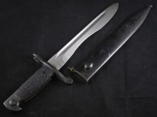 A Spanish Mauser bayonet complete with scabbard   ILLUSTRATED