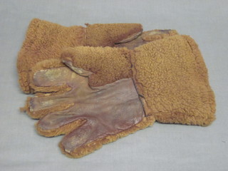 A pair of leather motoring/flying gloves