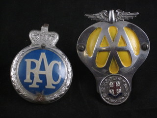 A circular plastic RAC members badge and an AA beehive badge  decorated The Arms of Crawley