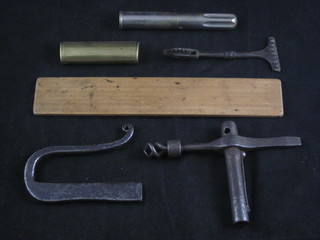 A wooden gauge, a pastry or leather workers crimp and various  curios