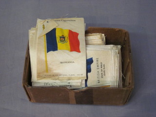 A collection of silk cigarette cards