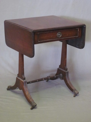 A Georgian style miniature mahogany sofa table fitted a drawer and raised on standard end supports with H framed stretcher 19"