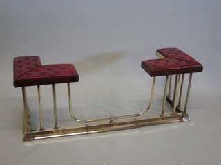 A brass railed club fender with half seat upholstered in red buttoned rexine 53"  ILLUSTRATED