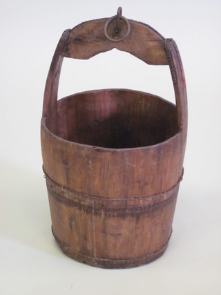 A reproduction wooden well bucket