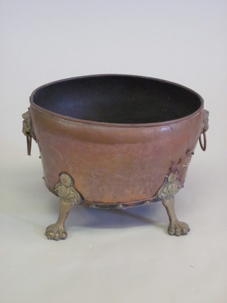 A 19th Century copper and brass planter with ring drop handles  17"