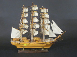 A wooden model of a 3 masted sailing ship 18"