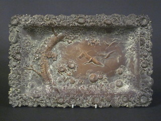 A rectangular Oriental embossed metal tray decorated storks 13"