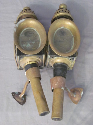 A pair of coaching lamps