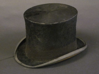 A gentleman's black top hat by Samuel Mortlock & Sons,  battered condition