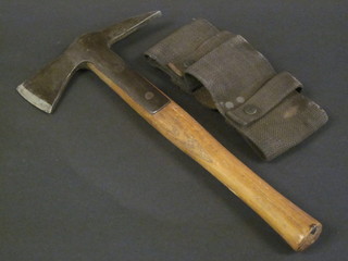 A Fireman's axe complete with webbing holster