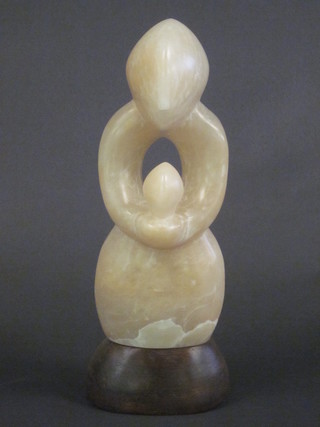R O Barr, a carved marble figure, raised on a wooden base 13"